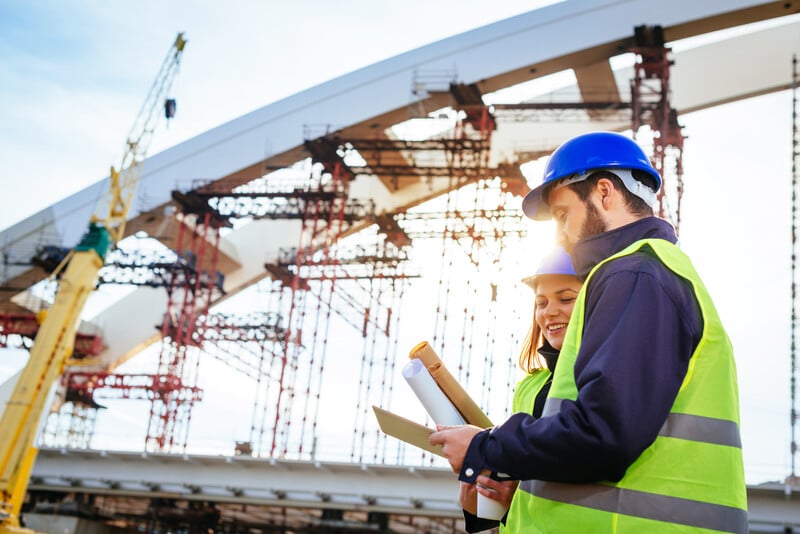 Man and woman at a construction site